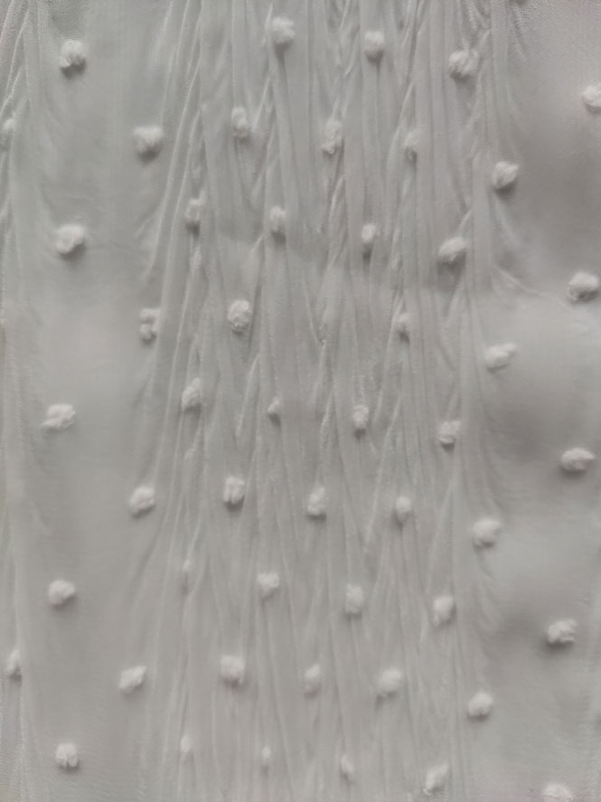 Crepe-embossed fabric